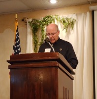 Sam Suter speaking at Agribusiness Luncheon